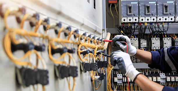 Professional Electrician technician working in Derma, MS